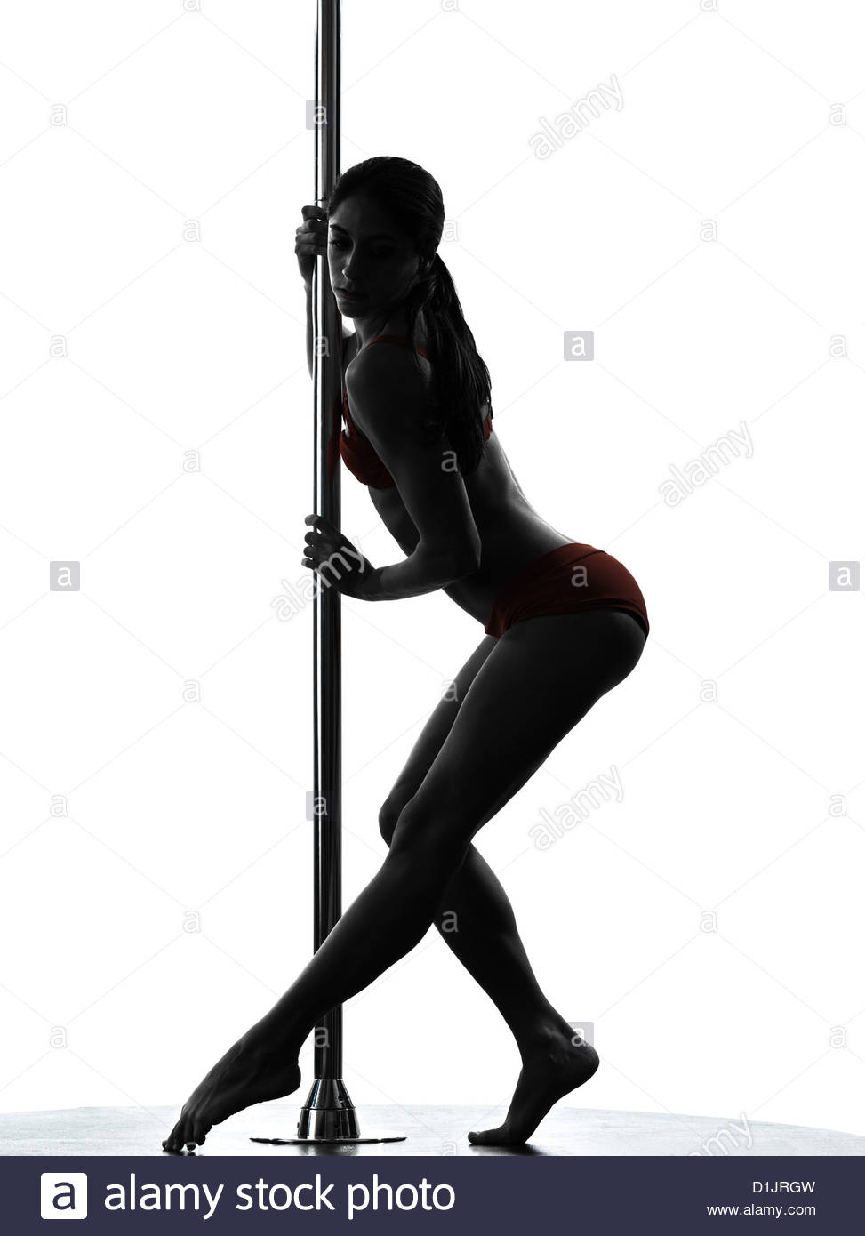 973x1390e Woman Pole Dancer Dancing In Silhouette Studio Isolated