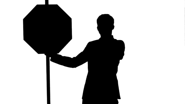 590x332 Silhouette A Businessman Holding A Stop Sign On By Fancystudio