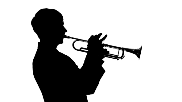 590x332 Silhouette. Musician Slowly Playing Trumpet In A Studio By Kinomaster