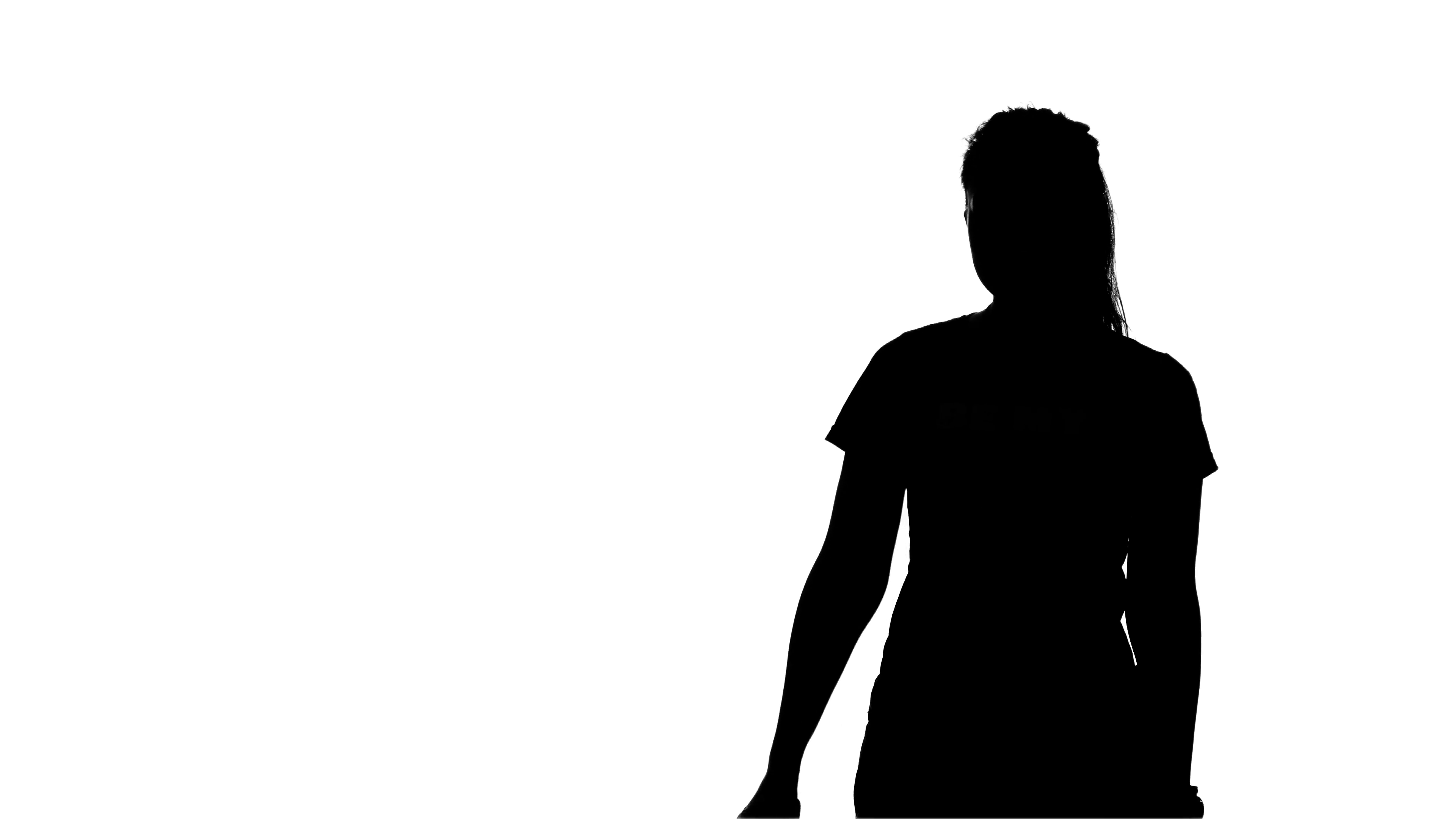 3840x2160 Woman Pulls Out From Behind The Gun. Silhouette. White Stock Video