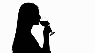 320x180 Girl Taking A Gun To Her Temple. Silhouette. White Stock Video