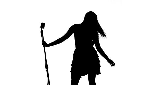 590x332 Silhouette Of Singer Dancing, Making Vigorous Movements Amp Begining