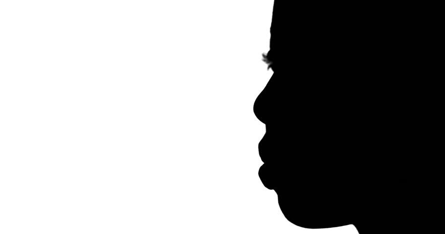 910x480 Silhouette Of A Man Smoking A Cigarette. He Takes A Drag, Then