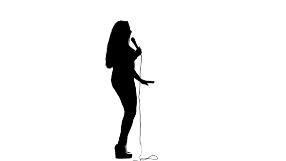 590x332 Singer Dances To The Beat Of Her Song. White Background