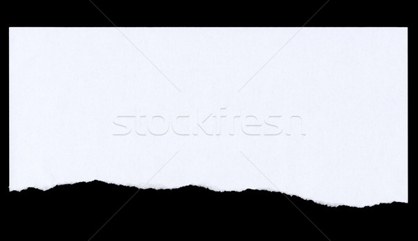600x346 Top Of Paper Page Torn Off And Isolated On Black. Stock Photo