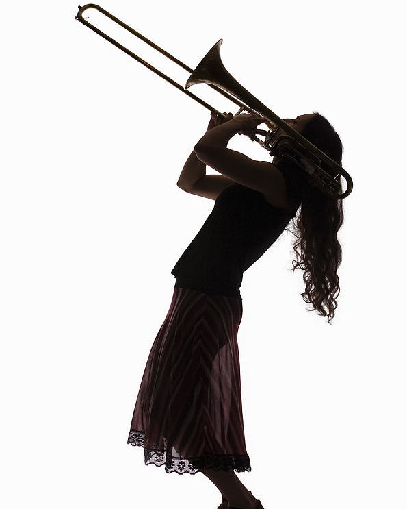 595x743 Silhouette Of Female Trombone Player Poster By Pm Images