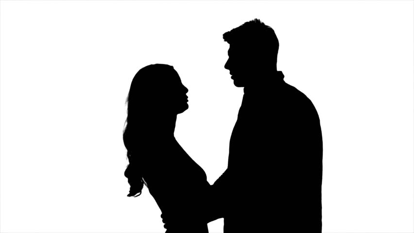 852x480 Loving Couple Look At Each Other And Begin To Kiss. Silhouette