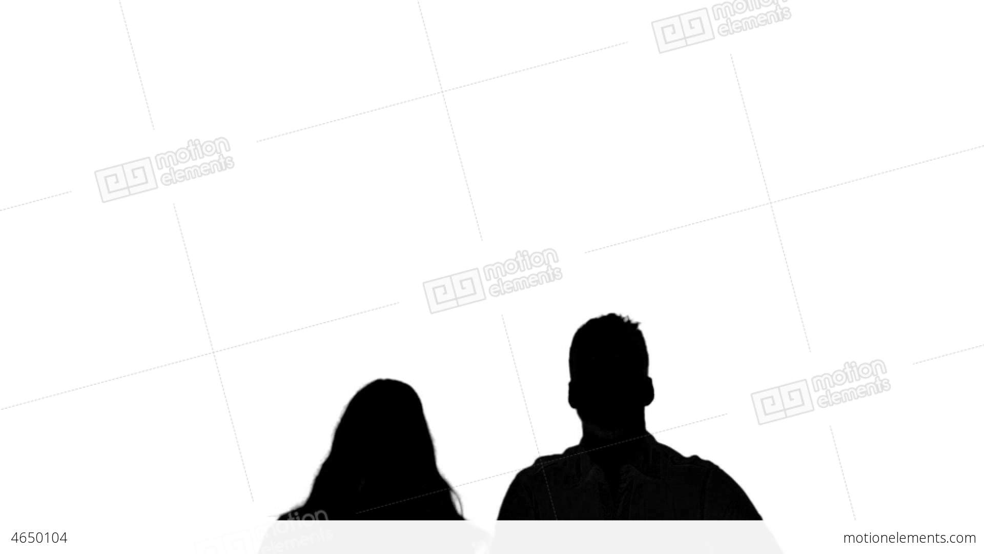 1920x1080 Silhouette Of Couple Jumping And Raising Arms On W Stock Video