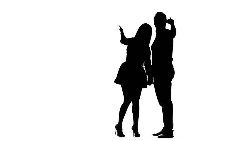 852x480 Silhouettes Of The Man And The Woman Who Dance A Waltz On A White
