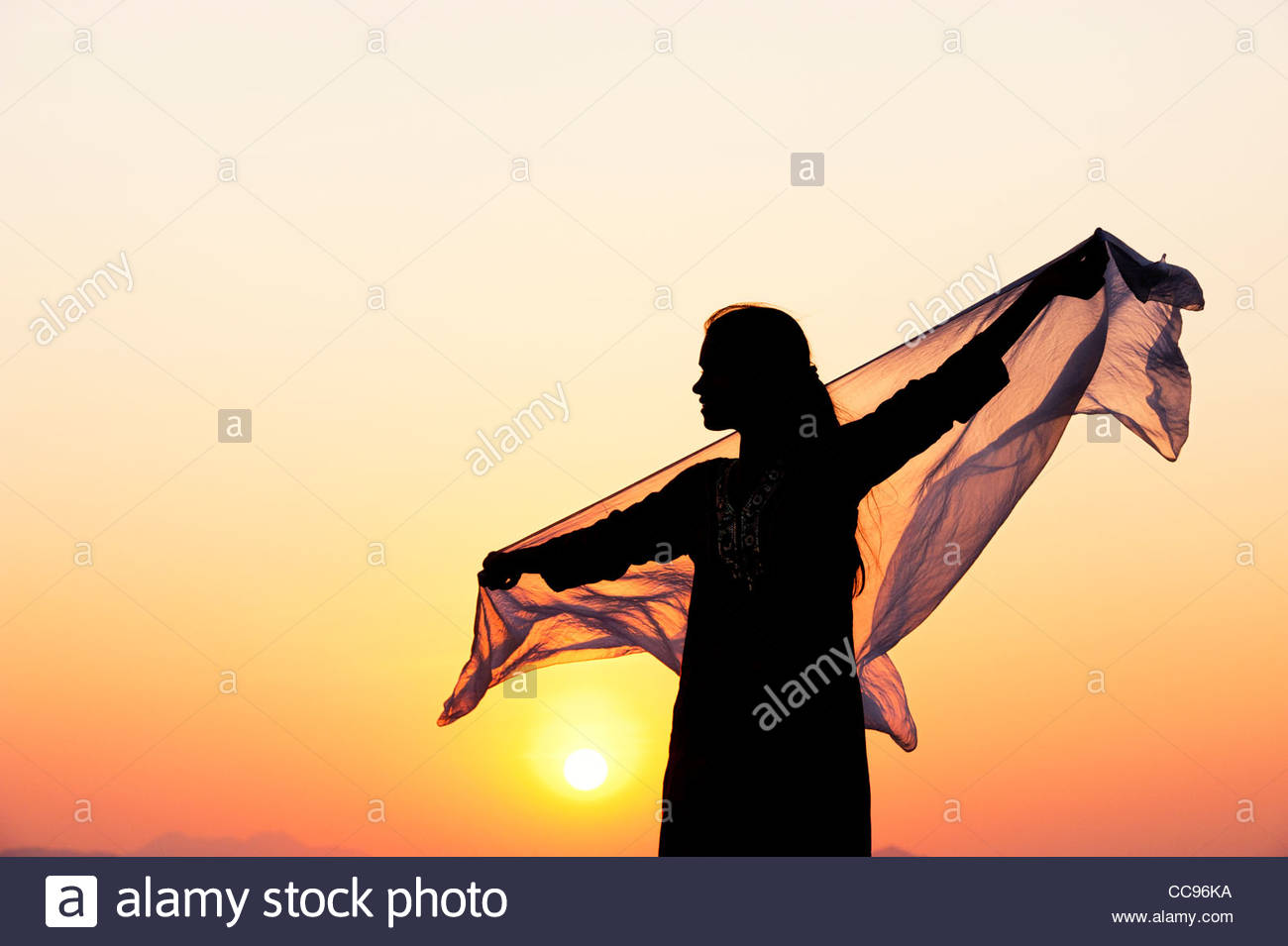 1300x955 Indian Girl With Veil In The Wind Silhouette Stock Photo 41999422