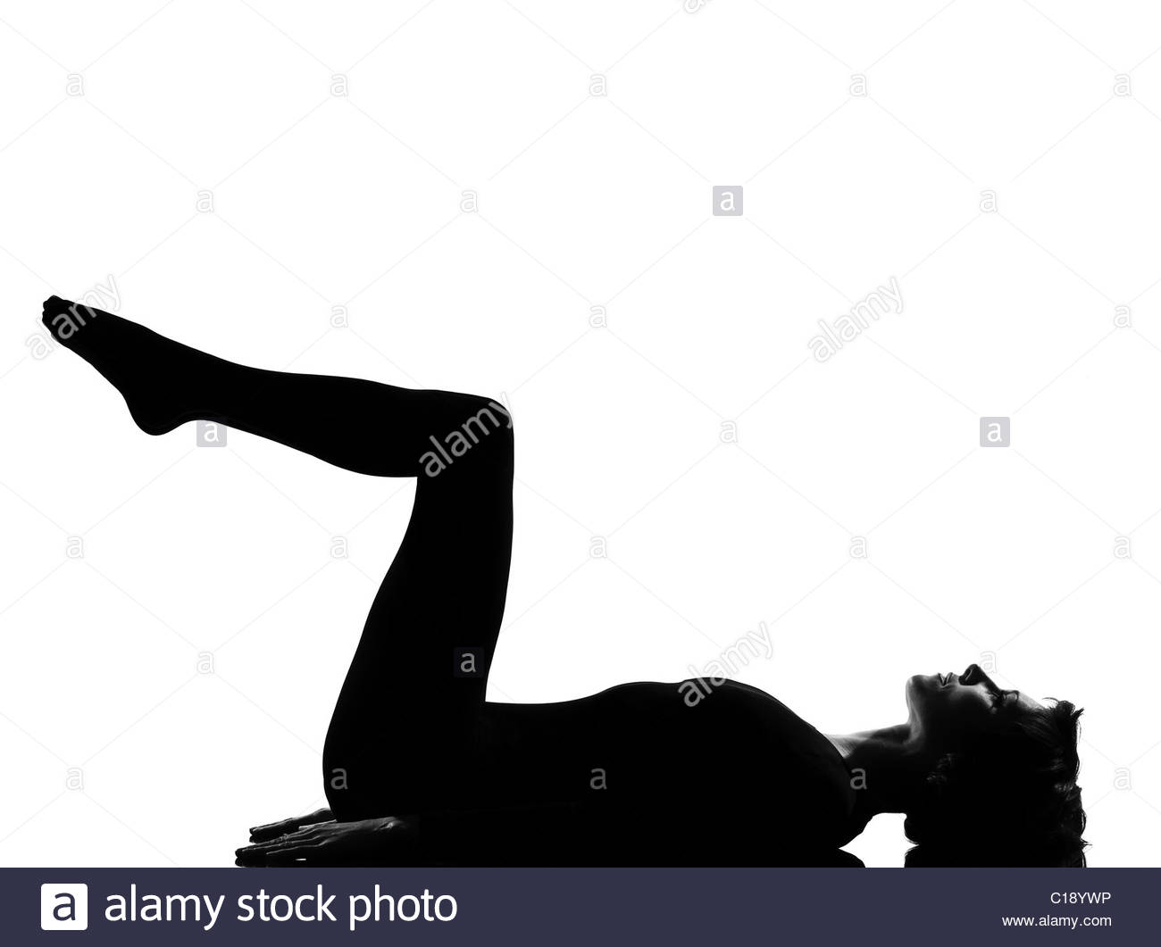 1300x1061 Woman Exercising Lying On Back Fitness Yoga Stretching In Shadow