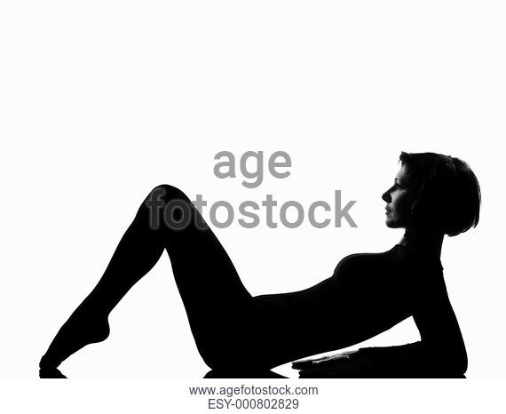 570x466 Woman Exercising Lying On Back Fitness Yoga Stretching In Shadow