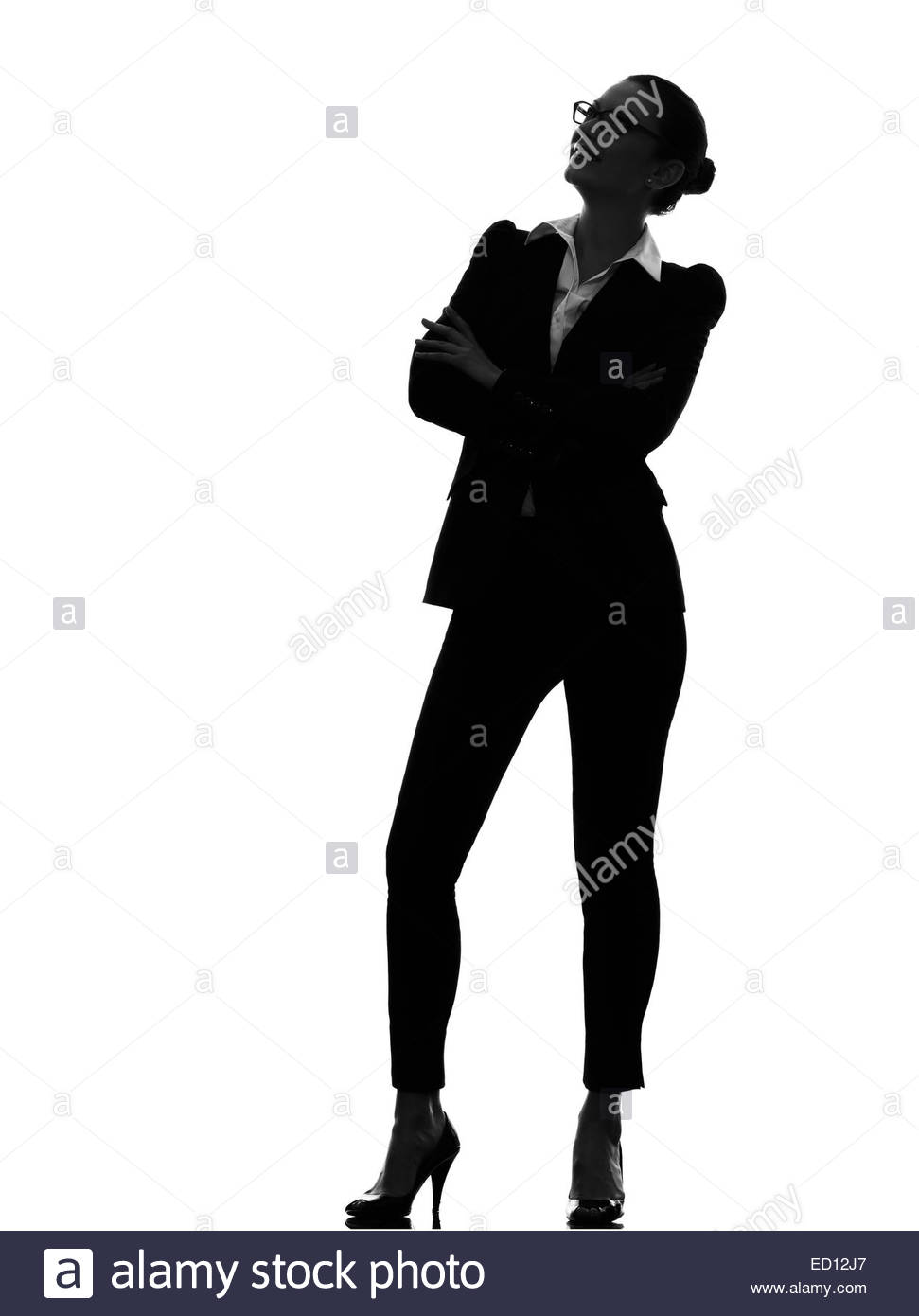 971x1390e Business Woman Standing Looking Up Smiling In Silhouette