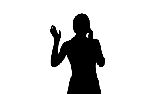 590x332 Silhouette Portrait Of Happy Young Woman Talking By Fancystudio