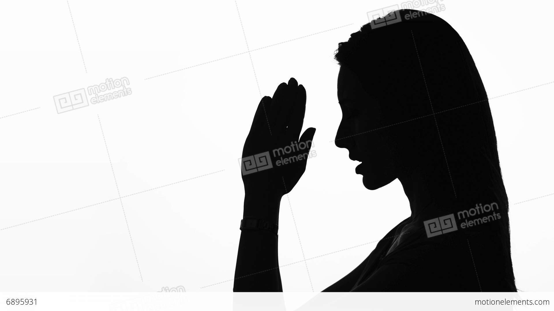 1920x1080 Closeup Profile Of A Woman Praying In Silhouette Isolated Stock