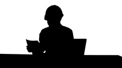 240x135 Silhouette Smiling Female Engineer Talking To The Camera Sitting