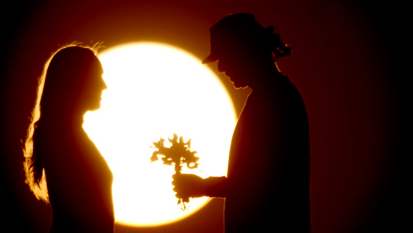 852x480 Happy Free Woman Enjoying In Sea Sunset. Silhouetted Against