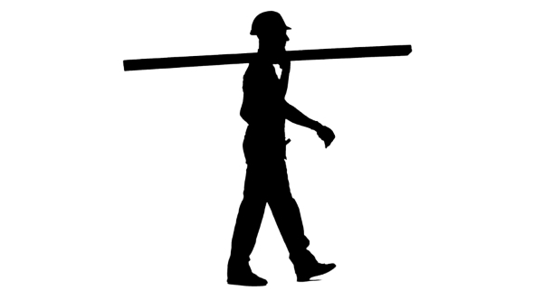 590x332 Silhouette Of Foreman In A Helmet Goes To Work With Wooden Boards