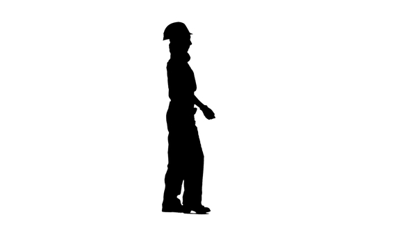 590x332 Girl Is Walking In A Helmet To Work. Silhouette By Kinomaster