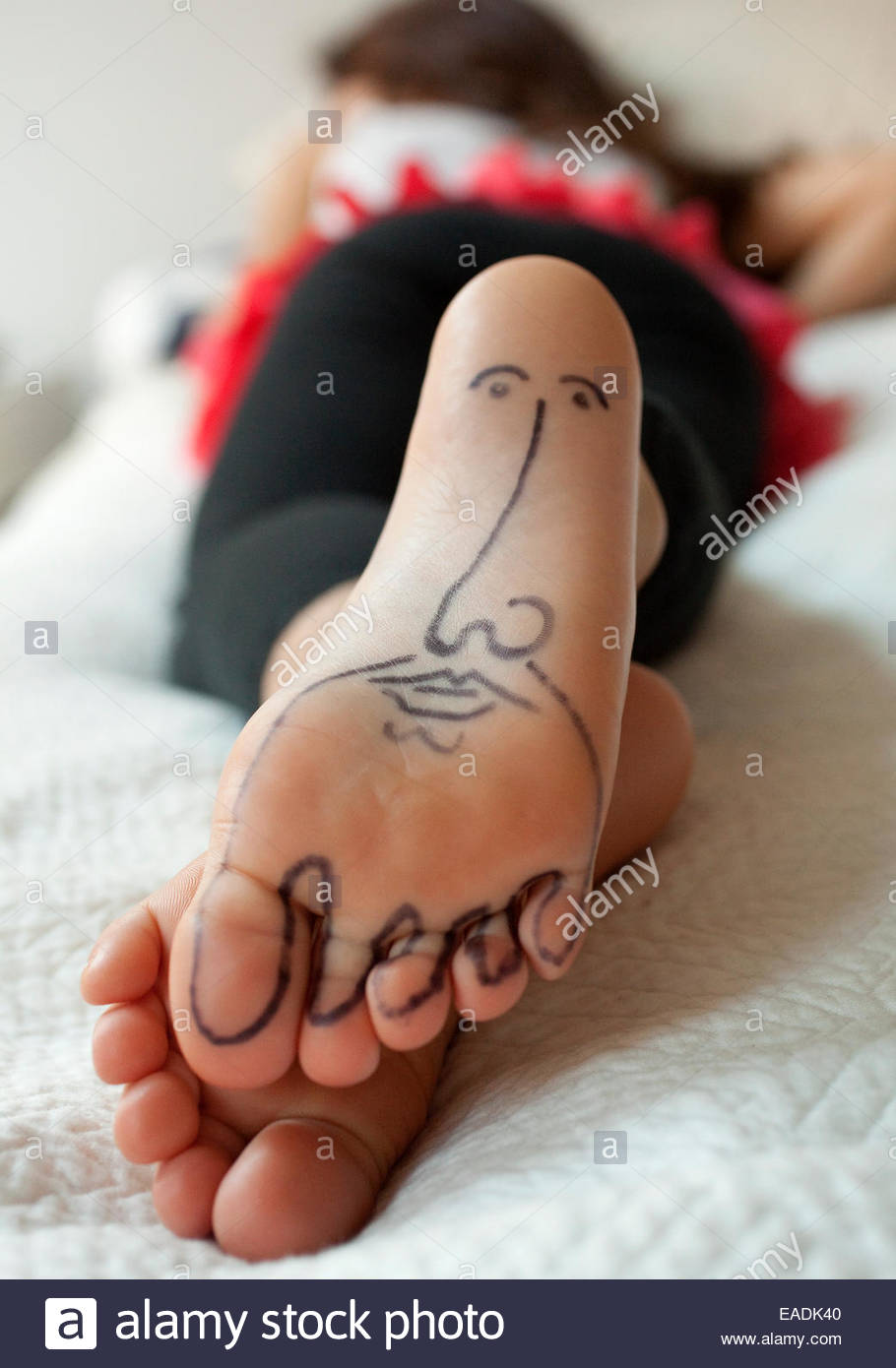 910x1390 Detail Of Drawing Of A Face On The Bottom Of A Young Girl's Foot