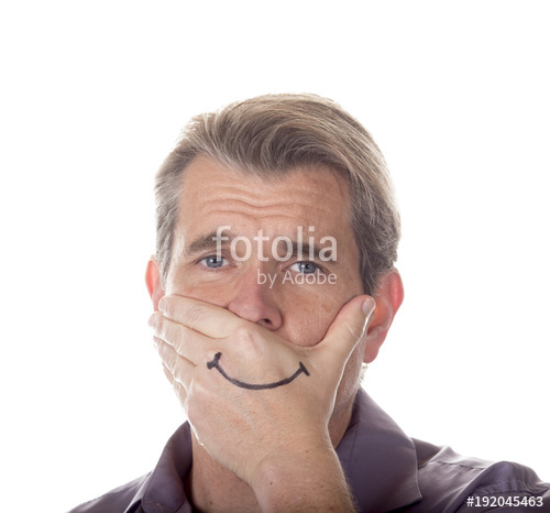 500x466 Man Hiding His True Emotions By Covering His Mouth With A Fake
