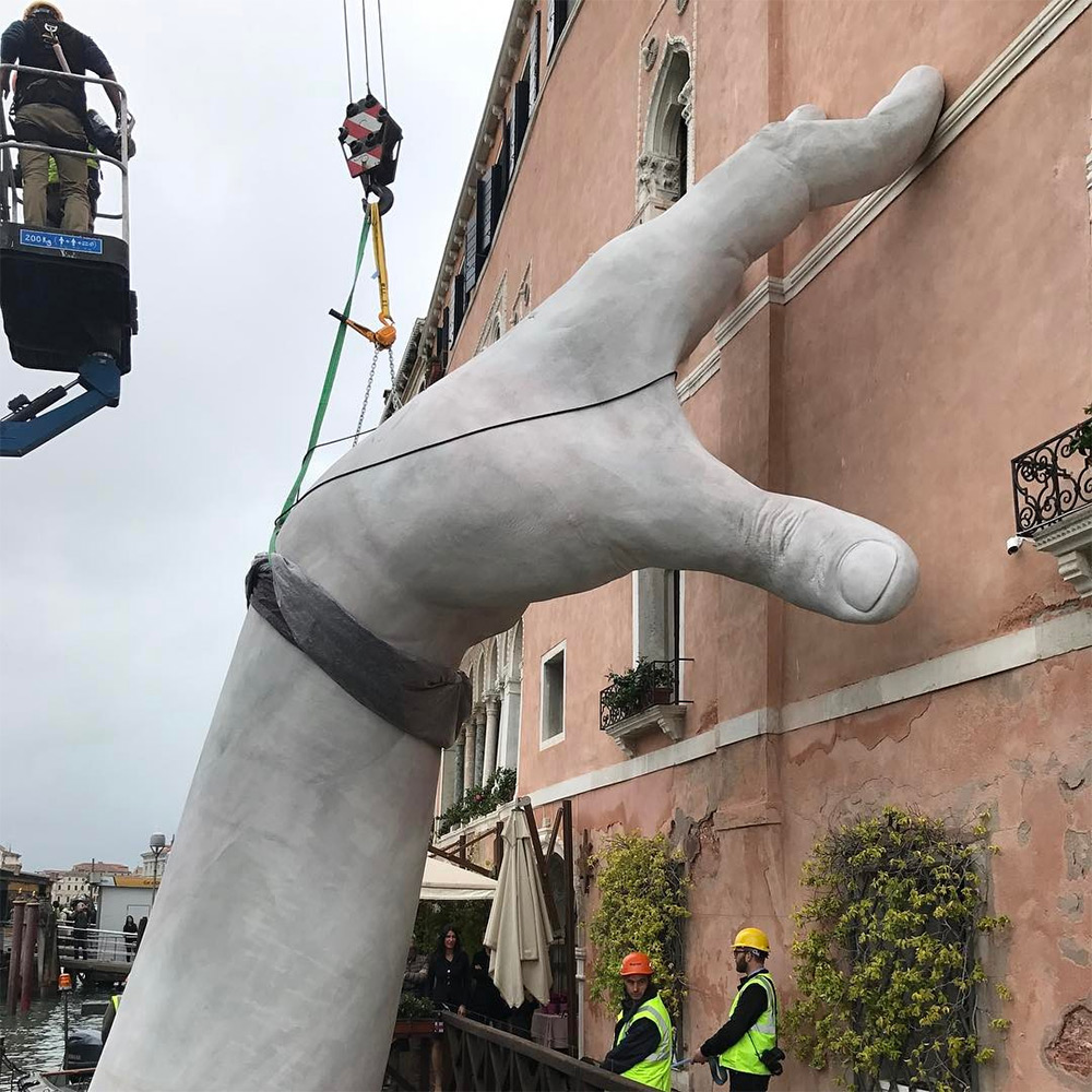 1000x1000 Support Monumental Hands Rise From The Water In Venice