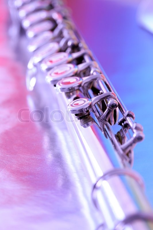 533x800 Purple And Blue Shades On Transverse Flute Closeup Stock Photo