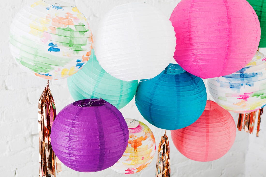 1100x733 Use Watercolors To Diy These Colorful Party Lanterns Brit + Co