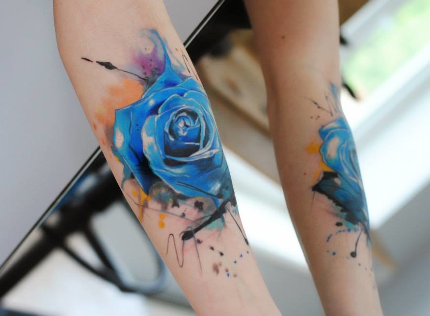 876x645 Blue Watercolor Rose Tattoo On Forearm By Aleksandra Katsan