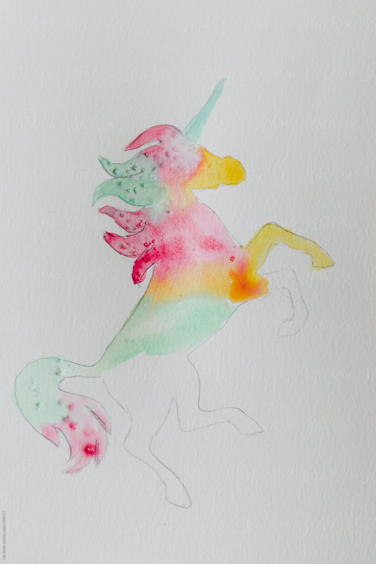 1200x1797 Teen Painting A Unicorn In Watercolour Stocksy United