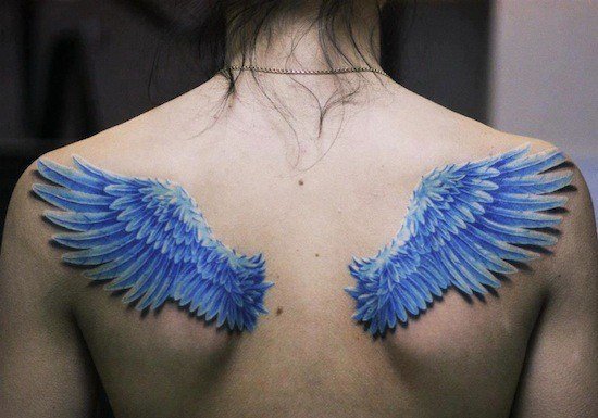 550x385 Wing Tattoos Across The Shoulders And Back Tattoo Articles