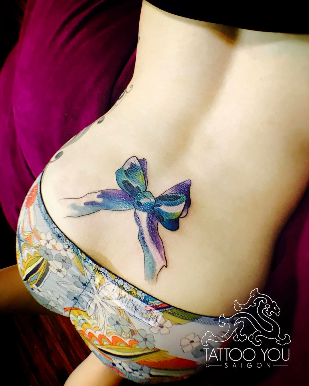1080x1349 Lower Back Bow Tattoo With Using Watercolor