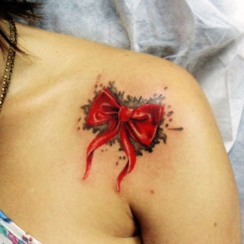 480x480 Picture Of Watercolor Red Bow Tattoo On The Shoulder