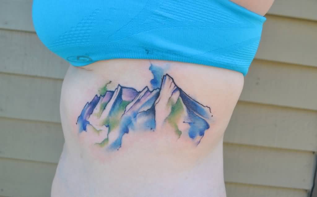 1024x638 Watercolor Mountain Tattoo On Side Rib Cage