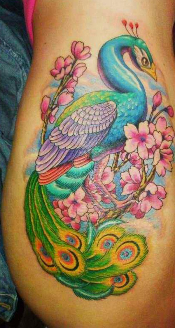 600x1122 Dazzling Peacock Tattoo On Back