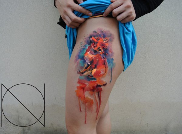 600x442 Orange Ink Watercolor Fox Tattoo On Thigh Of Girl
