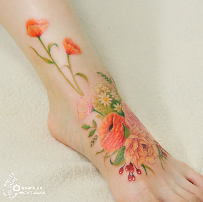 700x697 Colorful Flower Tattoos That Look Like Watercolor Paintings