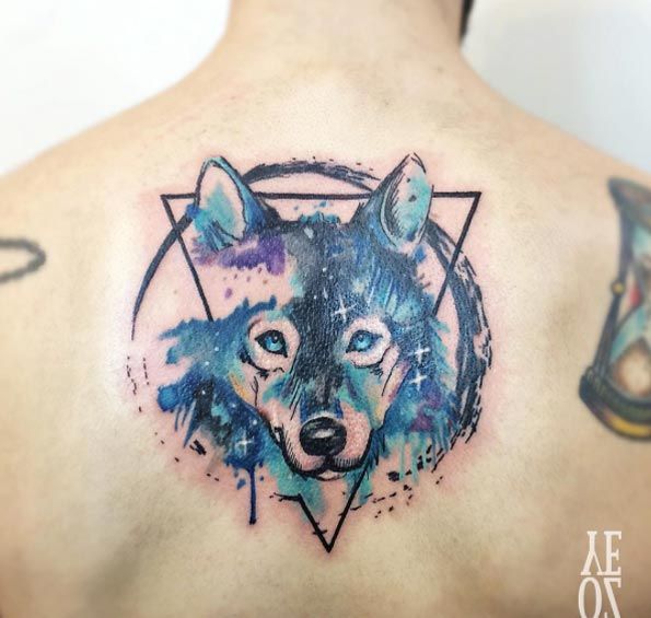 595x565 38 Creative Watercolor Tattoos Any Animal Lover Will Enjoy Wolf